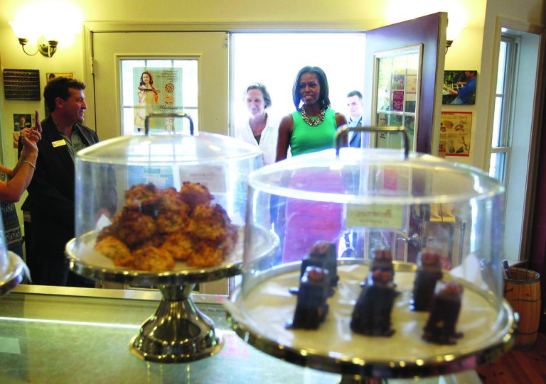 First lady Michelle Obama, shown entering  Mom's Apple Pie Bakery in Occoquan, Va., frets that obesity can block kids from advancing in life. (Photo by Alex Wong/Getty Images)
