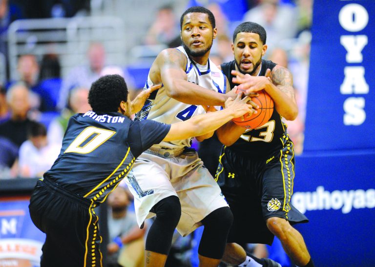 Nick Wass/AP
D'Vauntes Smith-Rivera and Georgetown beat Towson despite shooting 29.2 percent from the field Saturday.