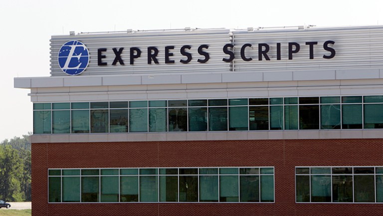 Express Scripts, a Fortune 100 prescription delivery company, plans to close a local facility that employs about 200 workers. (AP Photo/Jeff Roberson)