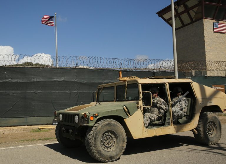 The mass movement intensifies a strategy the administration is relying on to empty the military prison in Cuba before Obama leaves office. (AP Photo/Ben Fox, File)