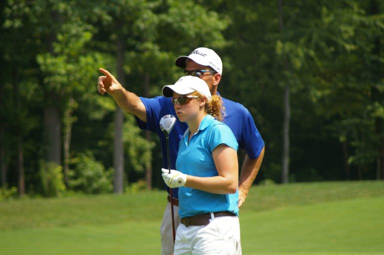  Elyse Smidinger, shown here with her father (and occasional caddie), will play in the Symetra Tour's Challenge at Musket Ridge, Friday through Sunday in Myersville, Md. / Photo by Kevin Dunleavy 