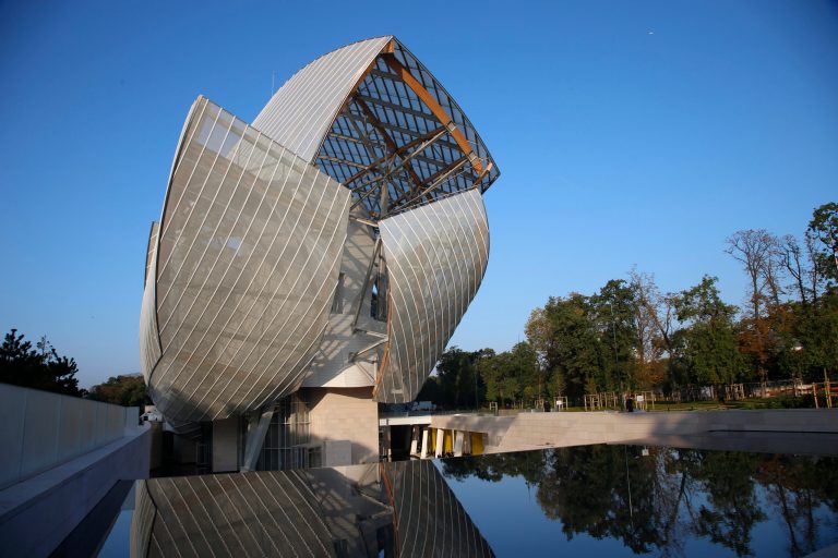 The Louis Vuitton Foundation building is pictured before the presentation of Louis Vuitton's Spring/Summer 2015 ready-to-wear fashion collection in Paris, France, Wednesday, Oct. 1, 2014. The foundation, designed by American architect Frank Gehry, will open its doors to the public on Oct. 27 , 2014. (AP Photo/Francois Mori)