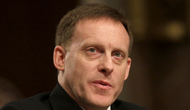Navy Vice Adm. Michael Rogers testifies on Capitol Hill in Washington, Tuesday, March 11, 2014, before the Senate Armed Services Committee hearing to become an admiral and director, National Security Agency/Chief, Central Security Services/Commander, United States Cyber Command.