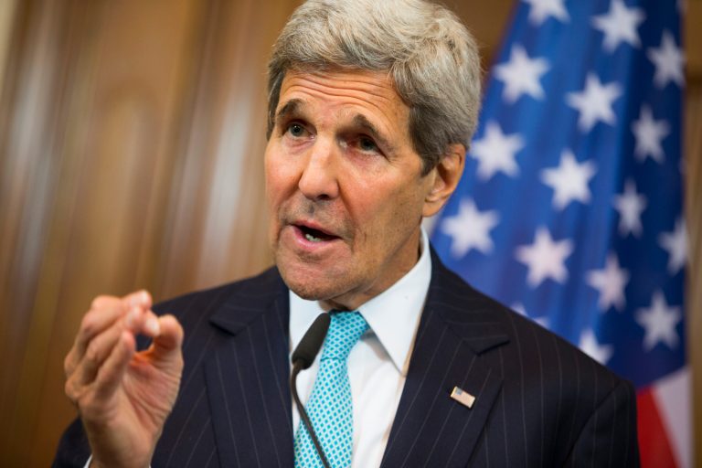 Secretary of State John Kerry gestures during a news conference with German Foreign Minister Frank-Walter Steinmeier about the ongoing crisis in Syria, at Villa Borsig, Berlin, Sunday, Sept. 20, 2015. (AP Photo/Evan Vucci, Pool)