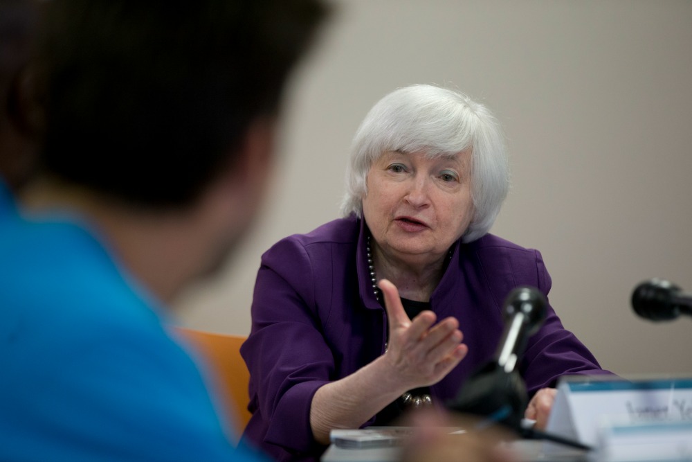 Fed officials downgrade economic projections