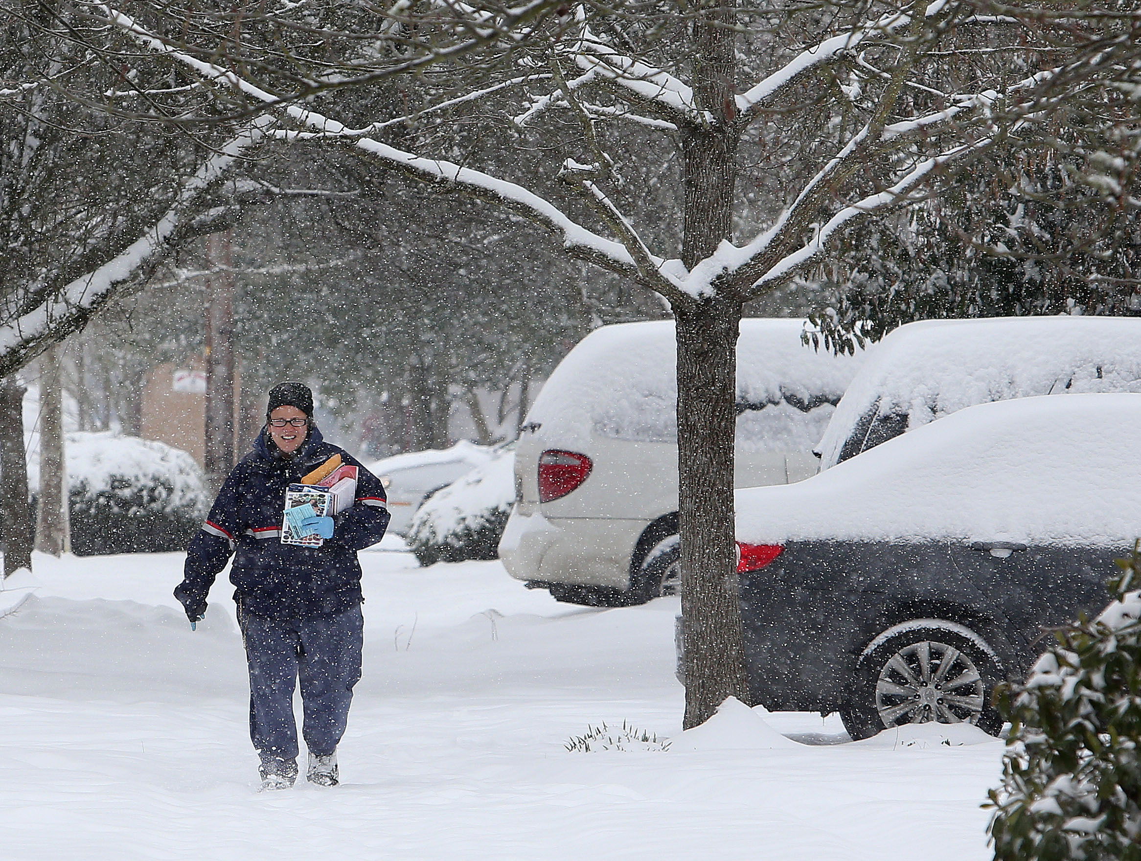 Snow, freezing rain blanket much of Northwest