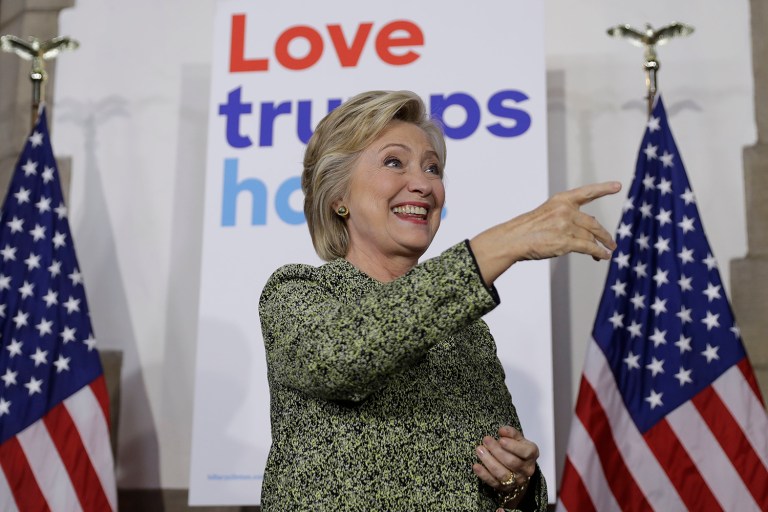 Democratic presidential candidate Hillary Clinton holds a 51-30 lead over Donald Trump, a 21-point advantage that's down 4 points from last month. (AP Photo/Matt Rourke)