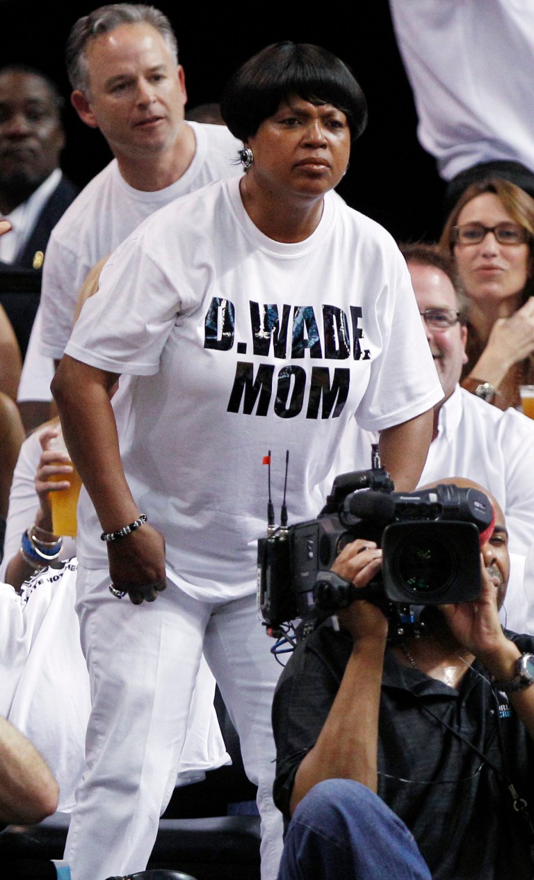   FILE - In this June 9, 2012, file photo, Jolinda Wade, Dwyane Wade's mother, watches during the first half of Game 7 of the NBA basketball playoffs Eastern Conference finals between the Miami Heat and the Boston Celtics, in Miami. The season started with 30 teams, got whittled down to 16 and now there are two _ the Miami Heat and Oklahoma City Thunder, set to begin the NBA finals on Tuesday night. (AP Photo/Lynne Sladky, File)  