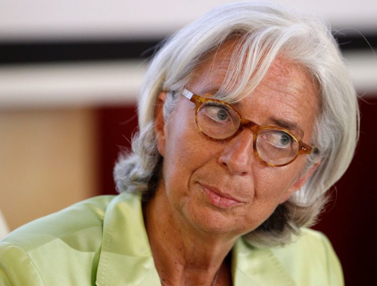 FILE - In this Thursday, July 18, 2013, file photo, International Monetary Fund (IMF) Managing Director Christine Lagarde listens during the discussion '' European Economic Integration: Stock Taking of Challenges and Opportunities'' in the Vilnius University  in Vilnius, Lithuania. The International Monetary Fund announced Tuesday, Oct. 8, 2013, it has cut its global economic growth forecasts for this year and next, mostly because of slower expansion in India, China, Brazil and other developing nations. (AP Photo/Mindaugas Kulbis, File)