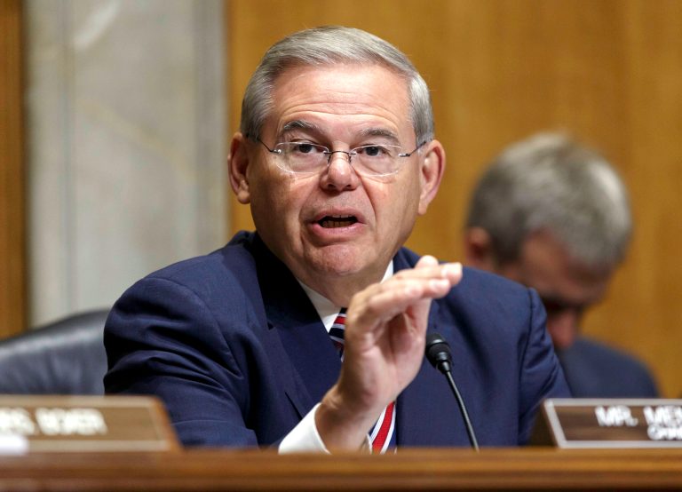FILE - In this July 17, 2014, file photo,. Senate Foreign Relations Chairman Robert Menendez, D-N.J., gestures as she speaks on Capitol Hill in Washington. Menendez threatened Thursday, July 24, to block U.S. arms sales to Iraq if Congress doesn't get an assessment of Iraqi forces and assurances the weapons won't fall into the hands of extremist militants.(AP Photo/J. Scott Applewhite, File)
