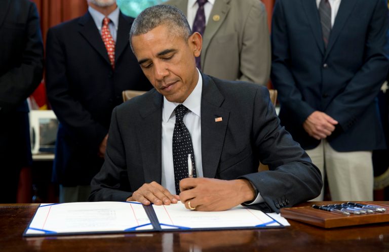 President Obama will sign an imperfect bill funding the government in order to avoid shutting down the federal government. (AP Photo)