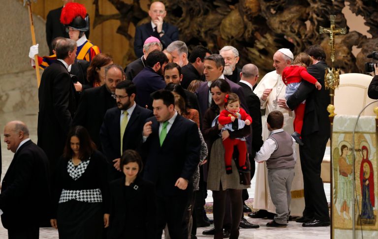 Pope Francis meets members of the Neocatechumenal Way missionary movement, in the Paul VI hall, at the Vatican, Saturday, Feb. 1, 2014. Francis met with thousands members of the Neocatechumenal Way, a community founded in Spain in the 1960s that seeks to train Catholic adults in their faith and is known for sending large families as missionaries around the world. (AP Photo/Riccardo De Luca)