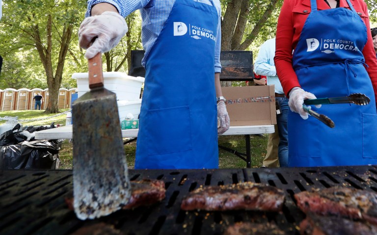 A Democratic candidate for Iowa governor provided CPR to a woman who appeared to be choking on some food at the Polk County Steak Fry fundraiser on Saturday. (AP Photo/Charlie Neibergall)