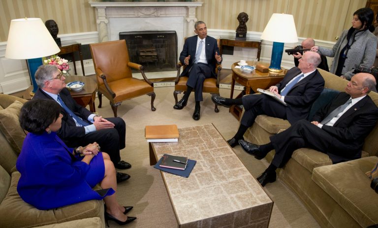 President Obama, joined by (from left) Commerce Secretary Penny Pritzker, former IBM CEO Sam Palmisano, former National Security Adviser Tom Donilon, and Homeland Security Secretary Jeh Johnson, speaks to media in the Oval Office of the White House on Feb. 17. Donilon and Palmisano were appointed as the Chair and Vice Chair, respectively, of the Commission on Enhancing National Cybersecurity. (AP Photo/Carolyn Kaster)