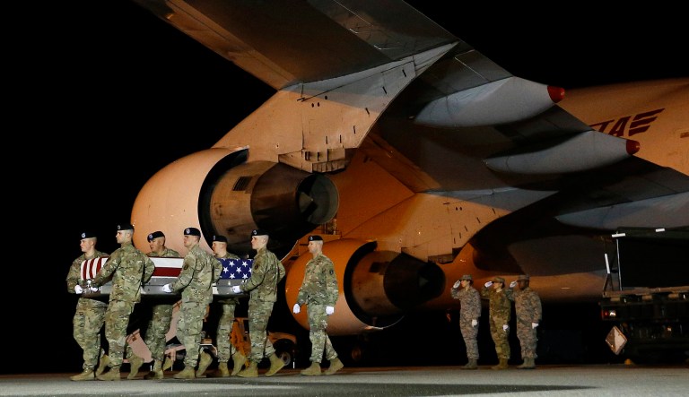 A U.S. Army carry team moves a transfer case containing the remains of Sgt. Leandro A. Jasso, Monday, Nov. 26, 2018, at Dover Air Force Base, Del. According to the Department of Defense, Jasso, 25, of Leavenworth, Wash., died Nov. 24, 2018, during combat operations in Helmand province, Afghanistan.