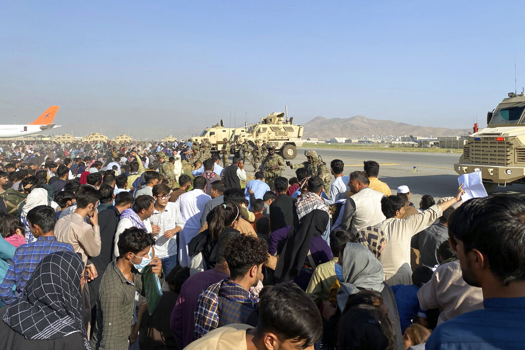 Volunteers empty their retirement funds to save at-risk Afghans