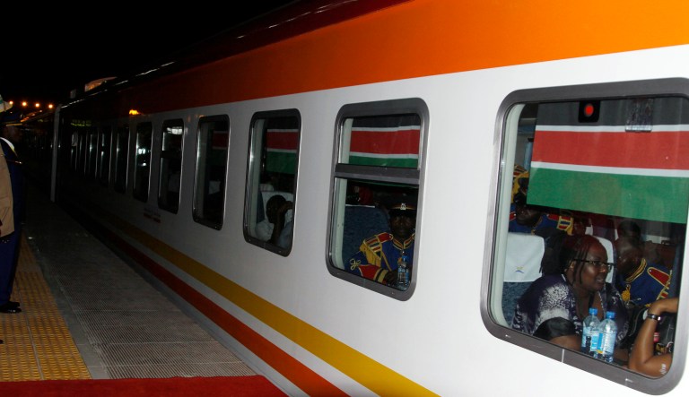 Passengers arrive by train at Nairobi Terminus in Nairobi, Kenya Wednesday, May 31, 2017. Kenya's president opened the country's largest infrastructure project since independence, a Chinese-backed railway costing nearly $3.3 billion that eventually will link a large part of East Africa to a major port on the Indian Ocean as China seeks to increase trade and influence.