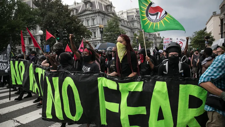 Counter protesters march through D.C.,during the "Unite the Right 2" rally.