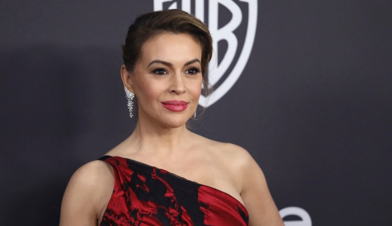 In this Jan. 6, 2019 file photo, Alyssa Milano arrives at the InStyle and Warner Bros. Golden Globes afterparty at the Beverly Hilton Hotel in Beverly Hills, Calif. 