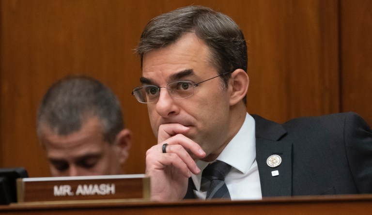 FILE - In this June 12, 2019 file photo, Rep. Justin Amash, R-Mich., listens to debate as the House Oversight and Reform Committee considers whether to hold Attorney General William Barr and Commerce Secretary Wilbur Ross in contempt for failing to turn over subpoenaed documents related to the Trump administration's decision to add a citizenship question to the 2020 census, on Capitol Hill in Washington. 