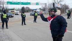 Canadian police move to disband trucker convoy at Ambassador Bridge