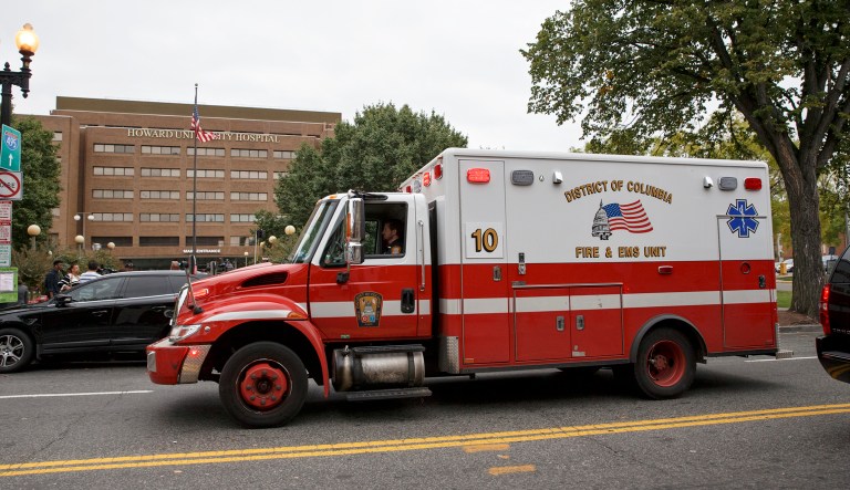 Howard University Hospital in Washington is seen Friday, Oct. 3, 2014, as a District of Columbia ambulance passes.