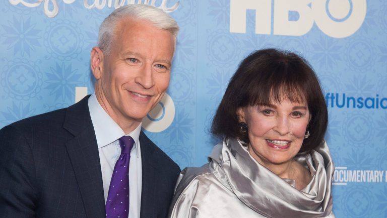 FILE - In this April 4, 2016 file photo, CNN anchor Anderson Cooper and Gloria Vanderbilt attend the premiere of "Nothing Left Unsaid" at the Time Warner Center in New York. Vanderbilt, the "poor little rich girl" heiress at the center of a scandalous custody battle of the 1930s and the designer jeans queen of the 1970s and '80s, died on Monday, June 17, 2019, at 95, according to her son, Cooper.