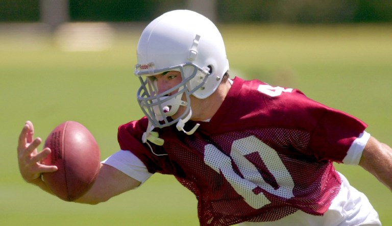 Former Arizona Cardinals safety Pat Tillman pulls in an interception with one hand in this May 4, 2001 photo, during mini camp, in Tempe, Ariz. Tillman, who walked away from his professional football career to join the Army Rangers, was killed in Afghanistan, U.S. officials said in 2004.