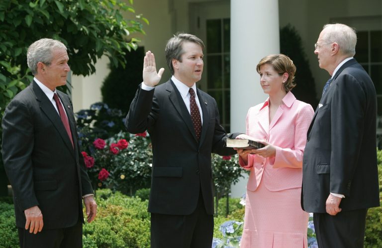 Front runner among gamblers for Supreme Court is Brett Kavanaugh, shown here being sworn in as judge for the U.S. Court of Appeals for the District of Columbia by U.S. Supreme Court Associate Justice Anthony  Kennedy in the Rose Garden of the White House, Thursday, June 1, 2006 in Washington. Holding the Bible is Kavanaugh's wife Ashley Kavanaugh.