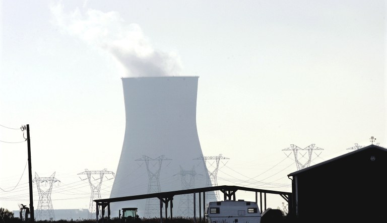 A tractor and a trailer sit near an out building on a small farm in Lower Alloways Creek Township, N.J., in rural Salem County. 