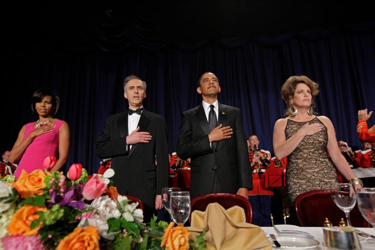 A new poll finds vast concerns about the Washington "swamp." It comes on the eve of the annual gathering of politicians, media and lobbyists at the White House Correspondents' Association dinner which President Trump is skipping. Here former President Barack Obama, with former first lady Michelle Obama at far left, stands for the national anthem dinner on May 9, 2009. They are flanked by media.