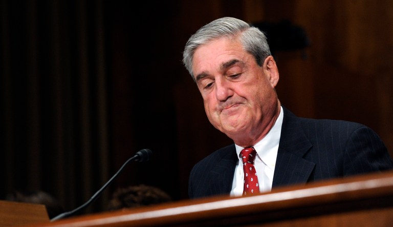 Robert Mueller pauses while testifying on Capitol Hill in Washington.