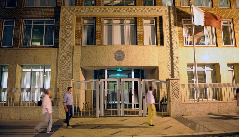 Pedestrians walk-by the Embassy of Qatar in Washington, Wednesday, April 7, 2010. A Qatari diplomat trying to sneak a smoke in an airplane bathroom on a flight from Washington to Denver, sparked a bomb scare, with fighter jets scrambled and law enforcement put on high alert, law enforcement officials said.