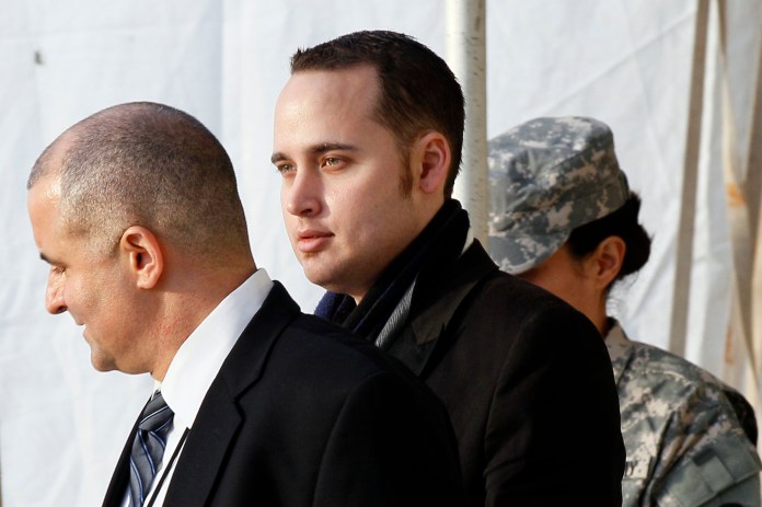 Adrian Lamo (pictured center), the hacker who told the FBI about Chelsea Manning, has died in Kansas.