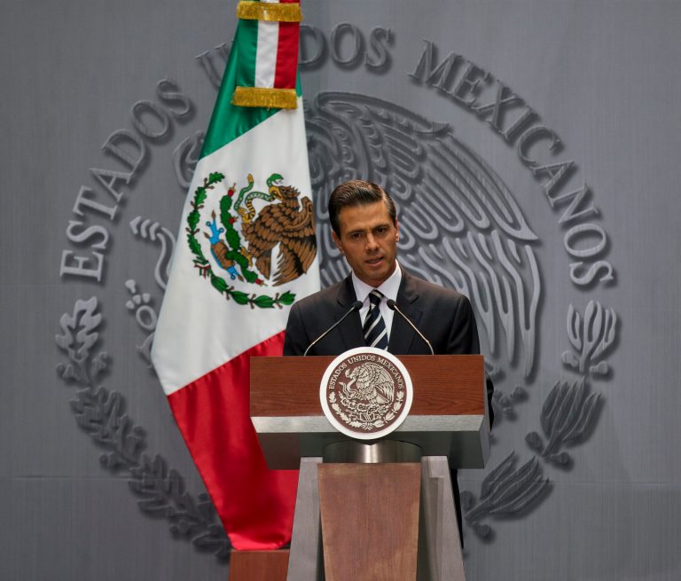 President Enrique Pena Nieto expresses his outrage over the recent disappearance of 43 students in Guerrero State following a violent confrontation with the police, during a press conference in Mexico City, Monday, Oct. 6, 2014. Guerrero state officials worked Monday to determine whether 28 bodies found in a clandestine grave are students who were attacked by police suspected of drug gang links in the southern state of Guerrero.