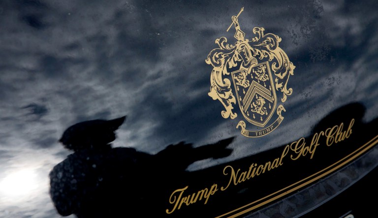 A photographer is seen reflected in a golf cart at the Trump National Golf Club Westchester in Briarcliff Manor, N.Y. 