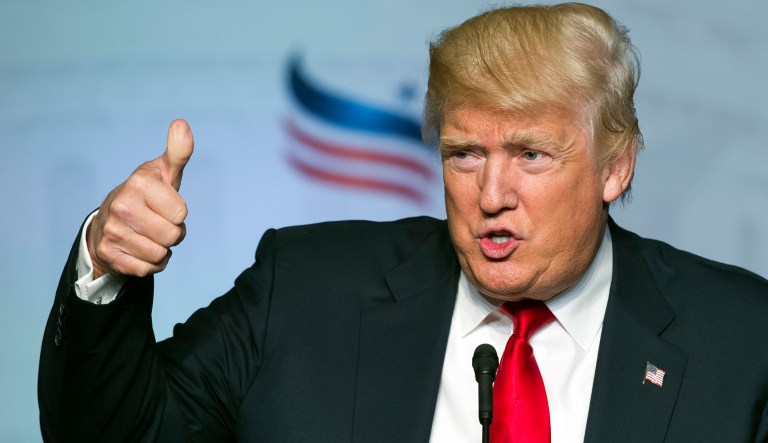 Republican presidential candidate Donald Trump gives a thumbs-up while addressing the Faith and Freedom Coalition's Road to Majority Conference in Washington, Friday, June 10, 2016.