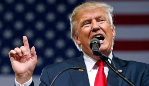 Republican presidential candidate Donald Trump speaks at a rally Saturday, June 18, 2016, in Phoenix.