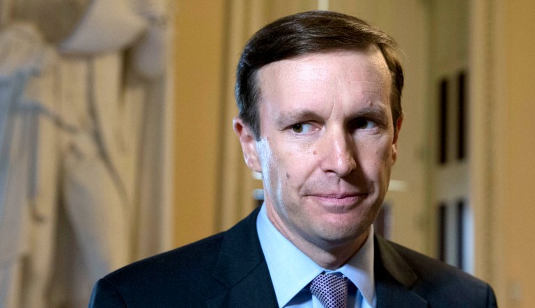 Sen. Chris Murphy, D-Conn., pauses to speak to the media as he heads to the House chamber on Capitol Hill in Washington, D.C.