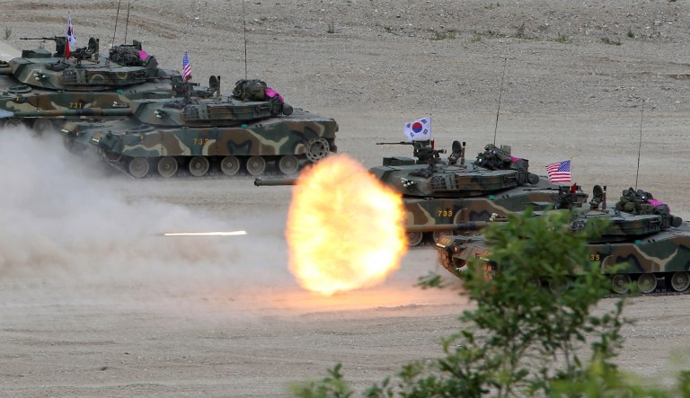A South Korean marine K1 tank fires during a joint military exercise between South Korea and the United States in Pohang, South Korea, Wednesday, July 6, 2016. Approximately 800 South Korean marines and 500 U.S. marines based in Okinawa, Japan took part in the exercise at a fire training field, according to South Korean military.