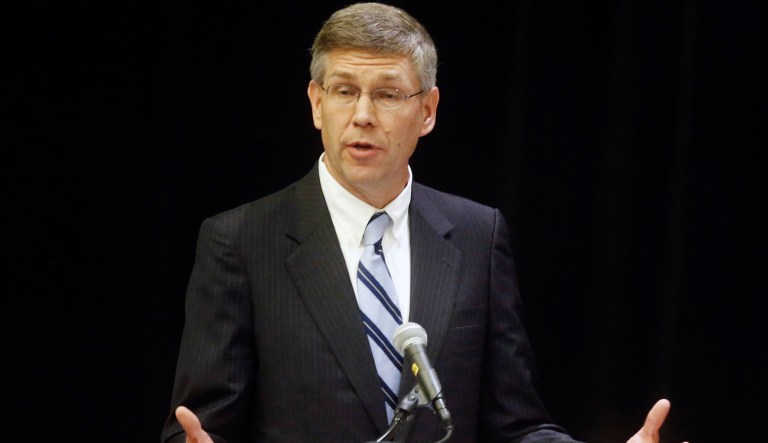 In this combination photo, Congressman Erik Paulsen, top, and State Sen. Terri Bonoff debate at the TwinWest Chamber Wednesday, Aug. 17, 2016. in Minnetonka, Minn. Bonoff, a Democrat, is hoping to unseat Paulsen, a Republican, in Minnesota's Third Congressional District race.