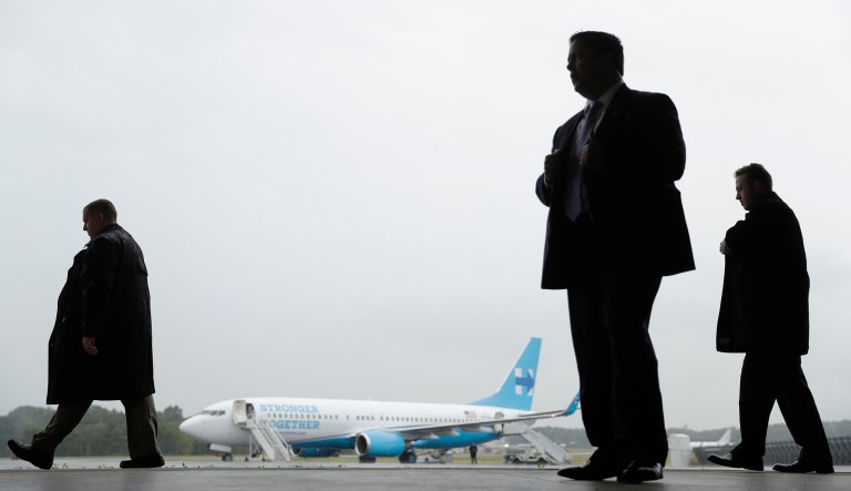 Secret Service agents stand guard ahead of Democratic presidential candidate Hillary Clinton's news conference at Westchester County Airport in White Plains, N.Y., on Sept. 19, 2016.