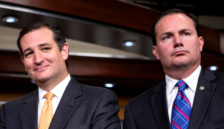 Sen. Mike Lee, R-Utah, right, and Sen. Ted Cruz, R-Texas, participate in a news conference on Capitol Hill in Washington.