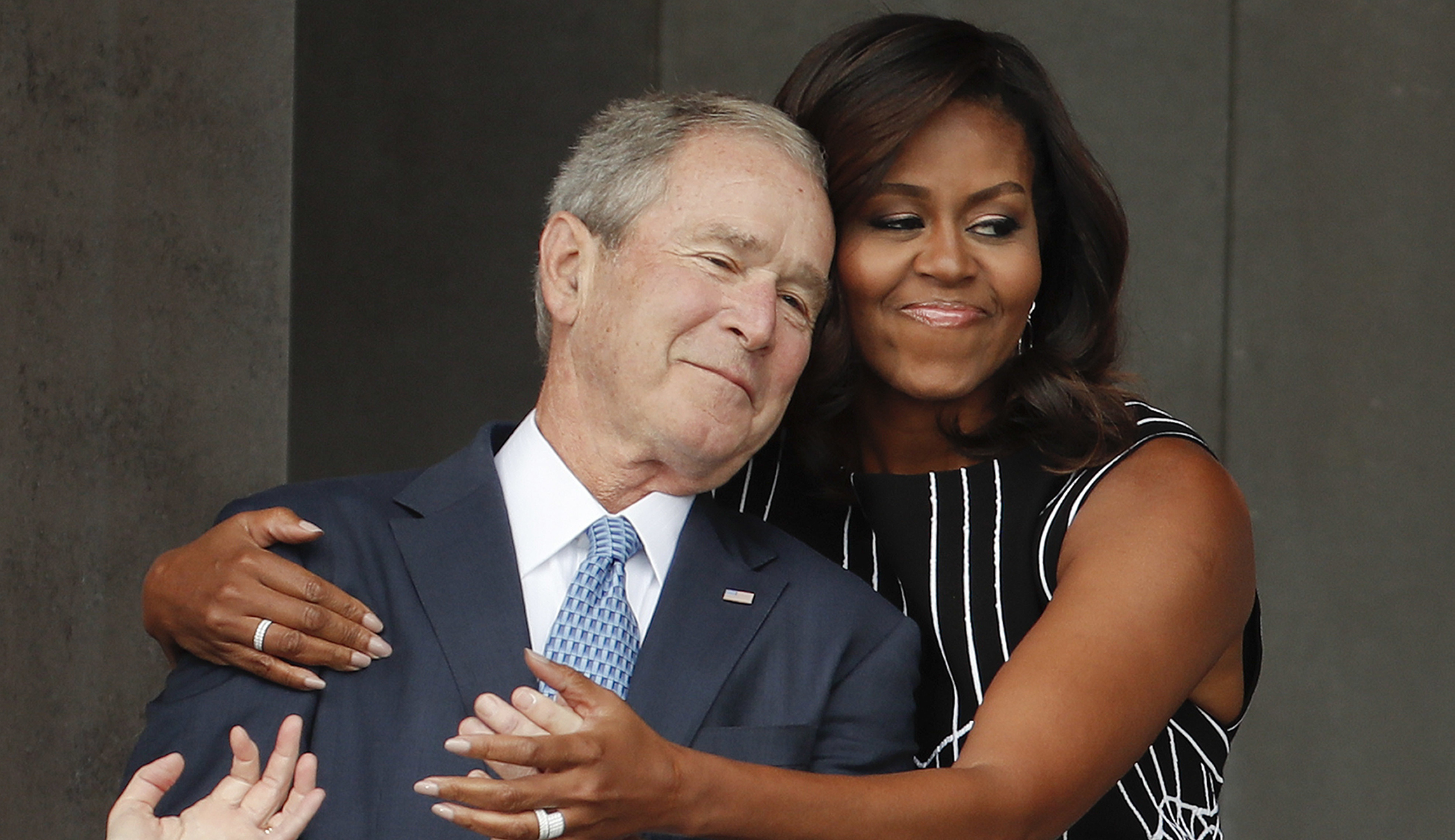 George W. Bush sneaks Michelle Obama candy at his father’s funeral