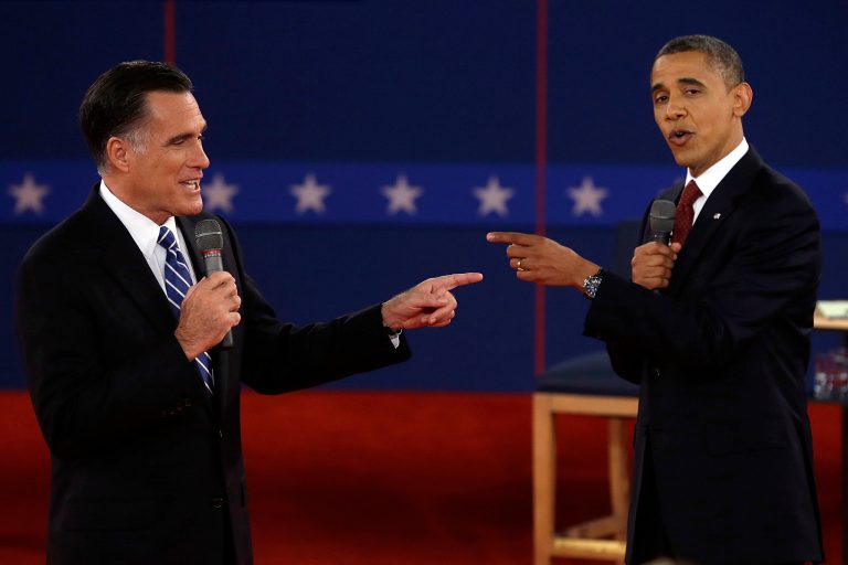 FILE - In this Oct. 16, 2012 file photo, Republican presidential nominee Mitt Romney, left, and President Barack Obama spar during the second presidential debate at Hofstra University in Hempstead, N.Y. For presidential candidates, the town hall debate is a test of stagecraft as much as substance. When Hillary Clinton and Donald Trump meet in the Sunday, Oct.9, 2016, contest, theyâll be fielding questions from undecided voters seated nearby. In an added dose of unpredictability, the format allows the candidates to move around the stage, putting them in unusually close proximity to each other.