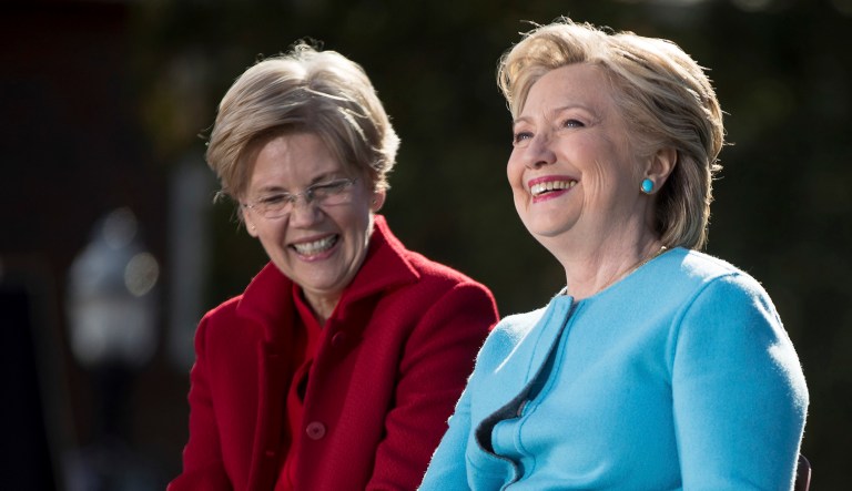 Democratic presidential candidate Hillary Clinton (right) is accompanied by Sen. Elizabeth Warren, D-Massachusetts.