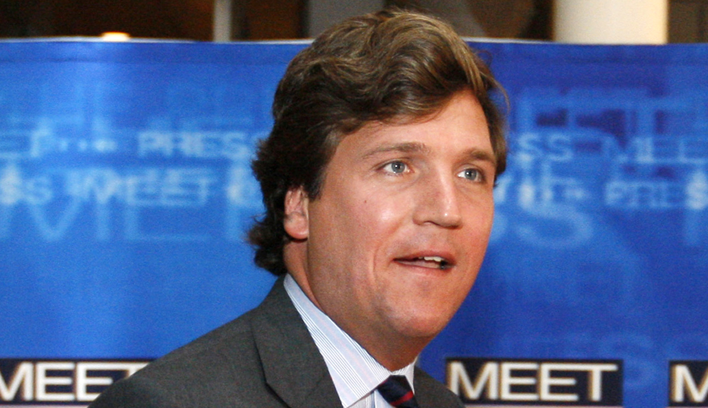 Political commentator Tucker Carlson arrives for the 60th anniversary celebration of NBC's Meet the Press at the Newseum in D.C.