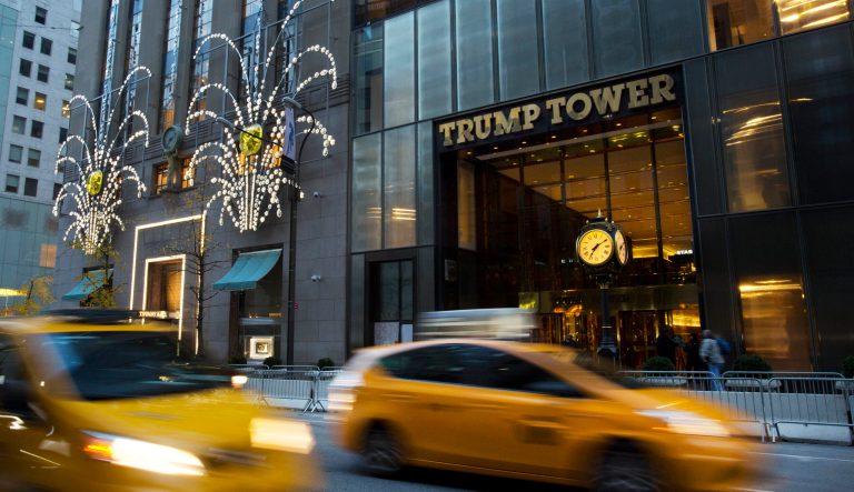 Traffic passes Trump Tower, Monday, Nov. 21, 2016, in New York. 