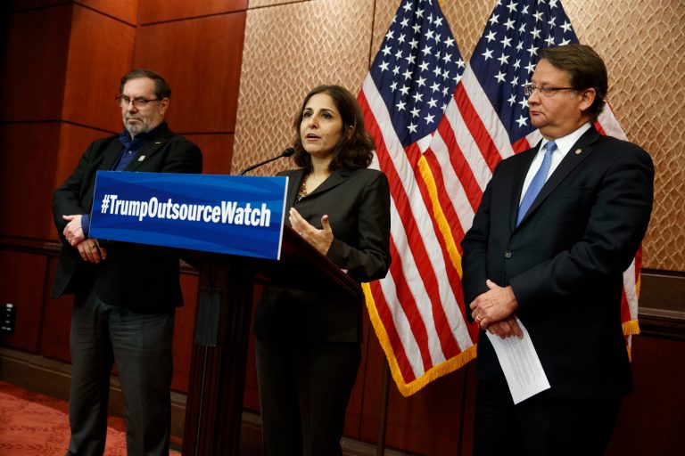 United Steelworkers International President Leo Gerard, left, and Sen. Gary Peters, D-Mich., right, listen as American Progress Actions Fund President Neera Tanden speaks during a news conference on Capitol Hill in Washington, Thursday, Dec. 8, 2016, to announce an effort to track jobs leaving the U.S.