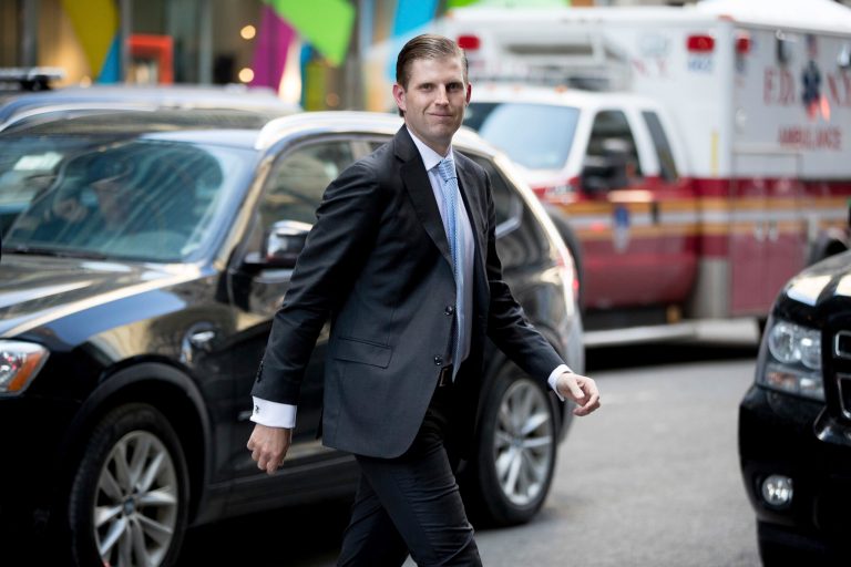 Eric Trump, shown outside Trump Tower just before his father's inauguration, is getting credit for helping a woman who passed out near a train station last week.